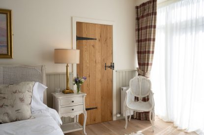 A king sized bedroom at Rowanrigg Steading, Perthshire