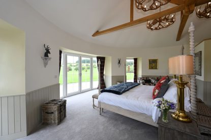 A king sized bedroom at Rowanrigg Steading, Perthshire