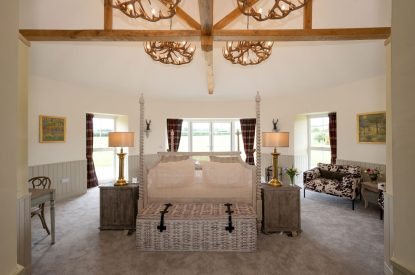A king sized bedroom at Rowanrigg Steading, Perthshire