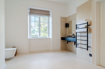 A shower room at White Exeter House, Devon