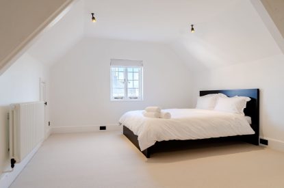 A super king size bedroom at White Exeter House, Devon
