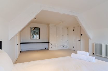 A super king size bedroom at White Exeter House, Devon