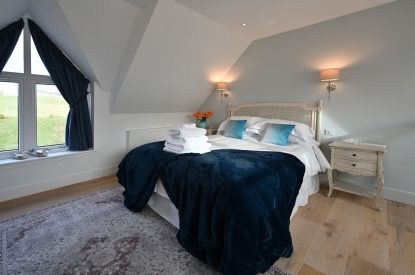 The king sized bedroom at Ternan's Cottage, Perthshire