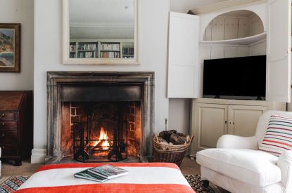 An open fireplace at Katsura House, Cotswolds