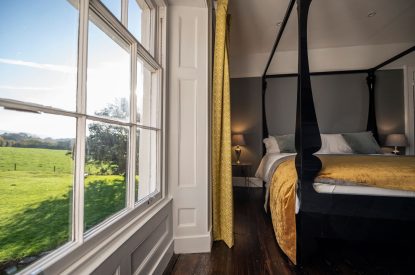 The four poster bedroom at Mihangel House, Denbighshire