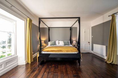 The four poster bedroom at Mihangel House, Denbighshire
