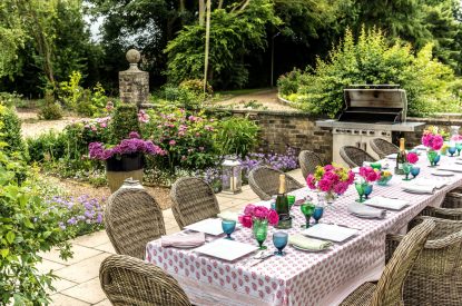 Outdoor dining at Hockham House, Norfolk Coast