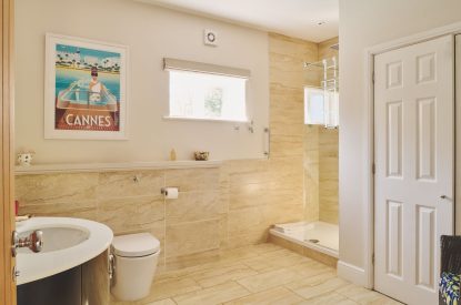 A shower room at Hockham Pool House, Norfolk Coast