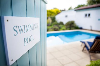 The heated outdoor swimming pool at Hockham Pool House, Norfolk Coast