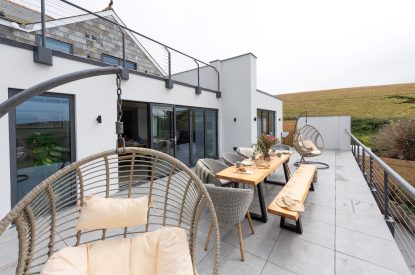Outdoor dining area at Watergate House, Cornwall