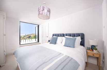 A super king-size bedroom at Watergate House, Cornwall