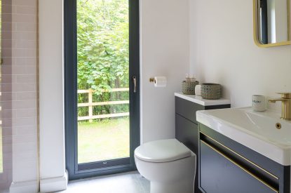 A shower room at Bracken Barn, Devon