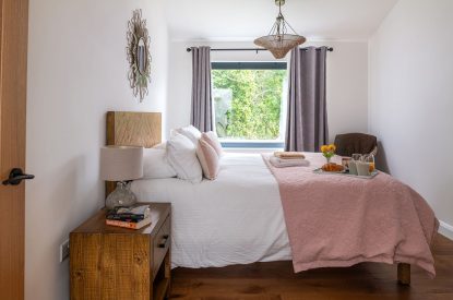 A king size bedroom at Bracken Barn, Devon