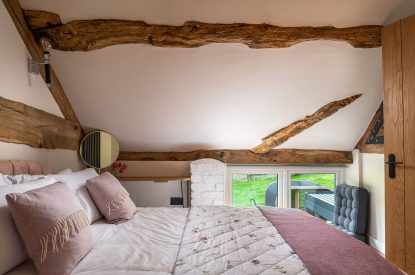 A king size bedroom at Swn y Nant, Wrexham