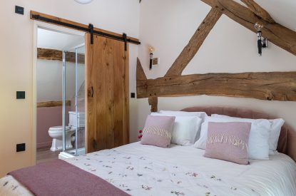 A king size bedroom at Swn y Nant, Wrexham