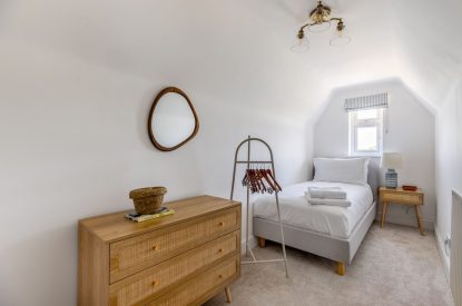 A single bedroom at Merry Manor, Essex