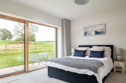A king sized bedroom at Kingfisher Forge, Shropshire