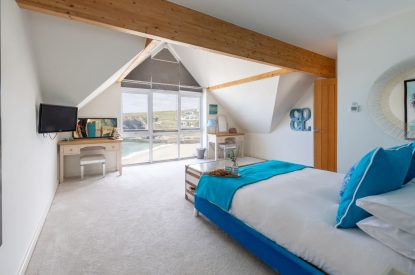 A super king sized bedroom at Tides Edge, Cornwall