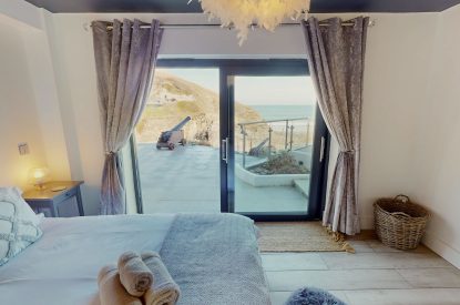 A king size bedroom at The Tide House, Cornwall