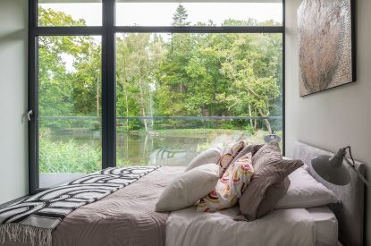 A king sized bedroom at The Bridge House, Hampshire