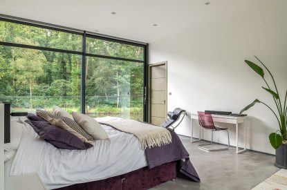 A super king sized bedroom at The Bridge House, Hampshire