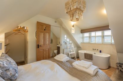 A king sized bedroom at Primrose Cottage, Yorkshire