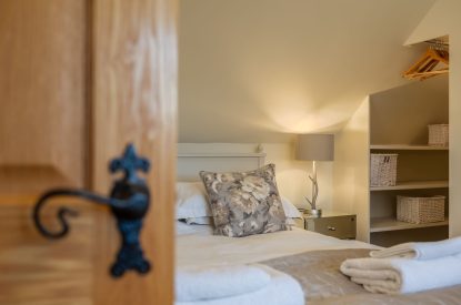 A king sized bedroom at Primrose Cottage, Yorkshire