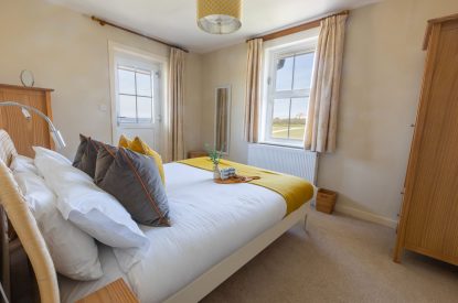 A king size bedroom at Sunset Sands, Cornwall
