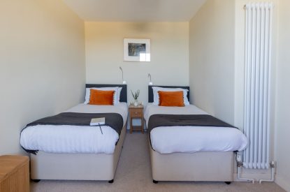 A twin bedroom at Sunset Sands, Cornwall
