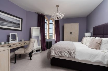 A king size bedroom at Priory Lodge, Essex