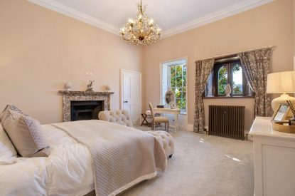 A super king size bedroom at Darcy Hall, Essex 