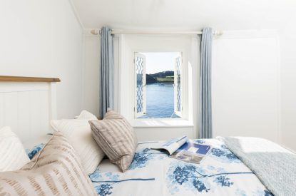 A king size bedroom at Mariner's Cottage, Cornwall