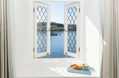 A king size bedroom at Mariner's Cottage, Cornwall