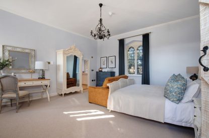 A super-king size bedroom at The Priory Retreat, Essex