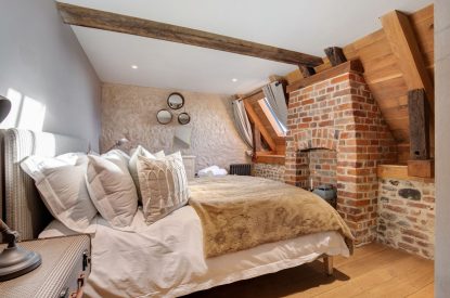 A king-size bedroom at The Priory Estate, Essex