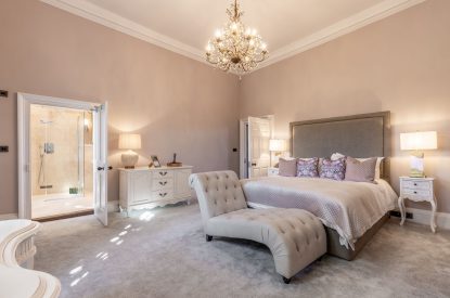 A king-size bedroom at The Priory Estate, Essex