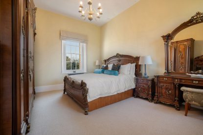 A king-size bedroom at The Priory Estate, Essex