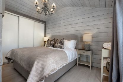 A king-size bedroom at The Priory Estate, Essex