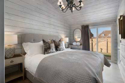 A king-size bedroom at The Priory Estate, Essex