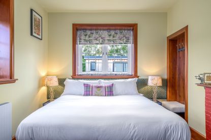 A super-king size bedroom at Oban House, Argyll and Bute