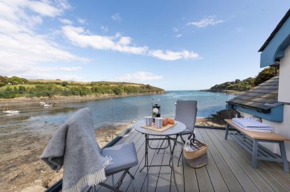 Outdoor dining overlooking the sea at Sea Island, Cornwall