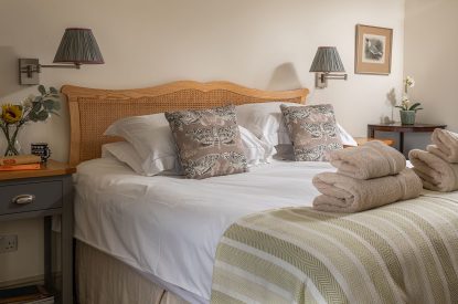 A super king-size bedroom at Buxton Farmhouse, Norfolk