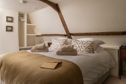 A super king-size bedroom at Buxton Farmhouse, Norfolk