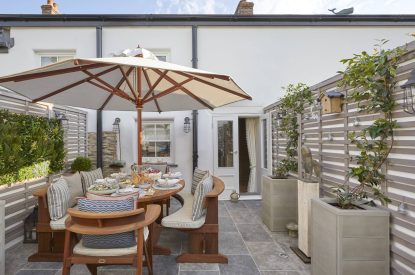 The outdoor patio and dining area at The Beach House, Devon