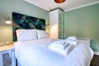 A double bedroom at Pine Cabin, Loch Lomond