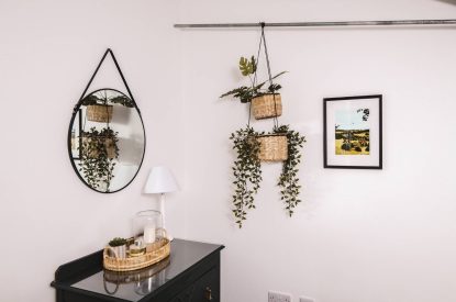 Hanging baskets on the wall at Luxury Penthouse, Cotswolds 