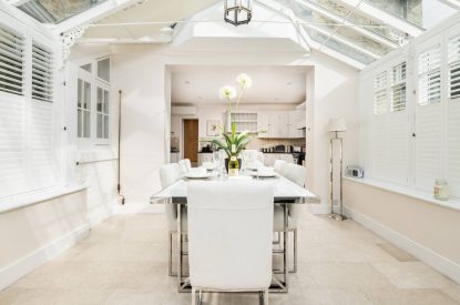 The kitchen with an island at Rose Cottage, Isle of Wight