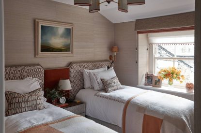 A twin bedroom at Beatrix Cottage, Lake District