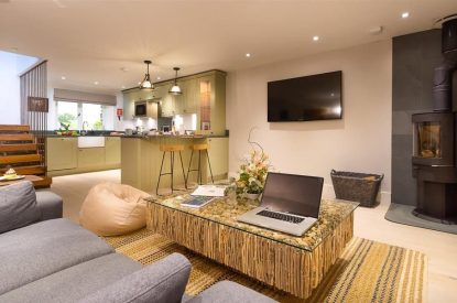 The living room with log burner at Shepherd's View, Lake District