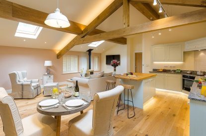 The open plan kitchen, living and dining room at Twitchers Cottage, Lake District